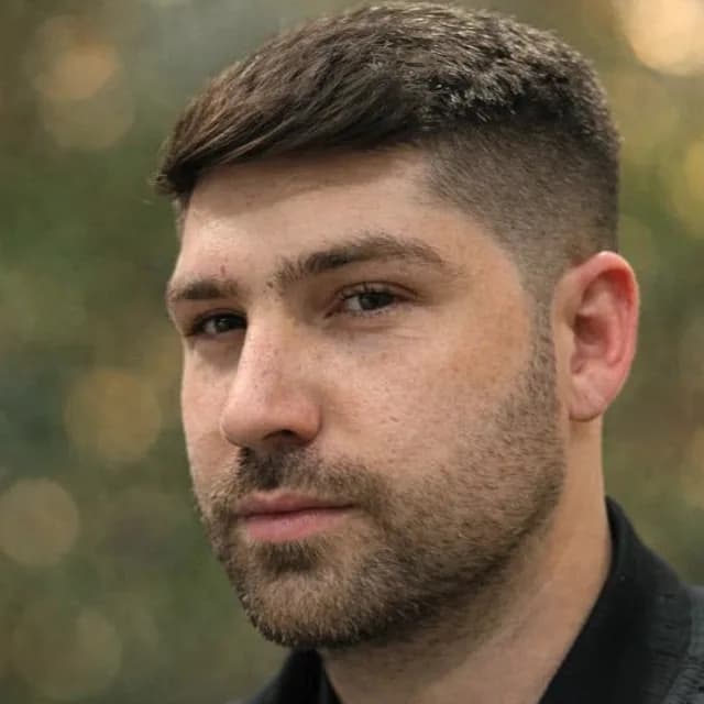 Shai Goldenberg, founder and CTO of A Versus B, photographed outdoors